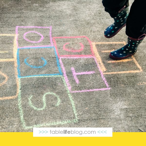 Letter hopscotch takes reading lessons outside and provides plenty of opportunity for movement while learning and reviewing.